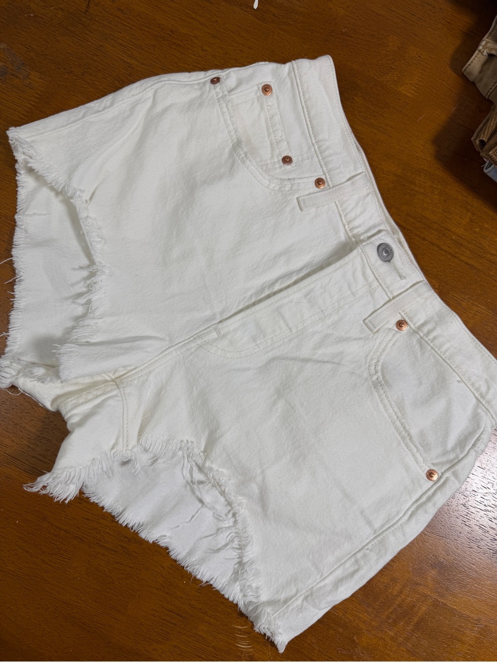 Levi's White Frayed Hem Denim Cutoff Shorts